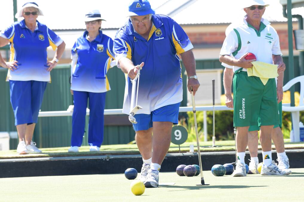 TOUGH DAY: Golden Square's Mal Finch bowls on Monday in his team's 22-shot loss to Kangaroo Flat. The Flat prevailed 74-52 at home in a strong performance. Picture: GLENN DANIELS