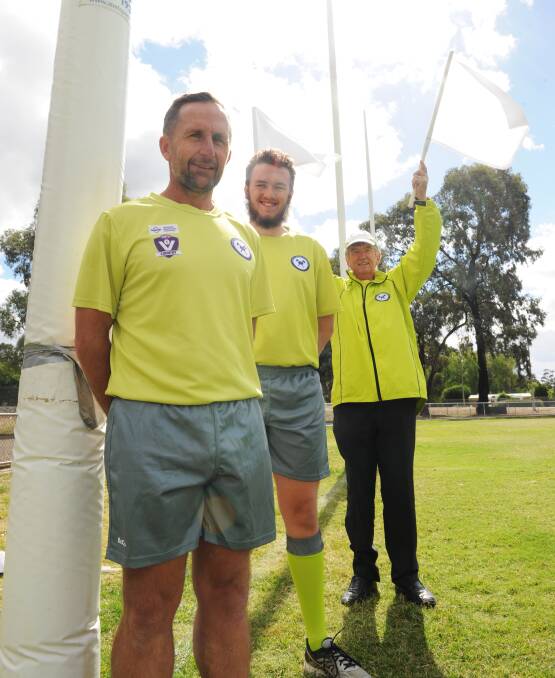 IN CHARGE: Bendigo Umpires Association members Scott Baxter, Mitch Davey and Noel Ridge are among about 160 registered umpires with the BUA. Picture: NONI HYETT