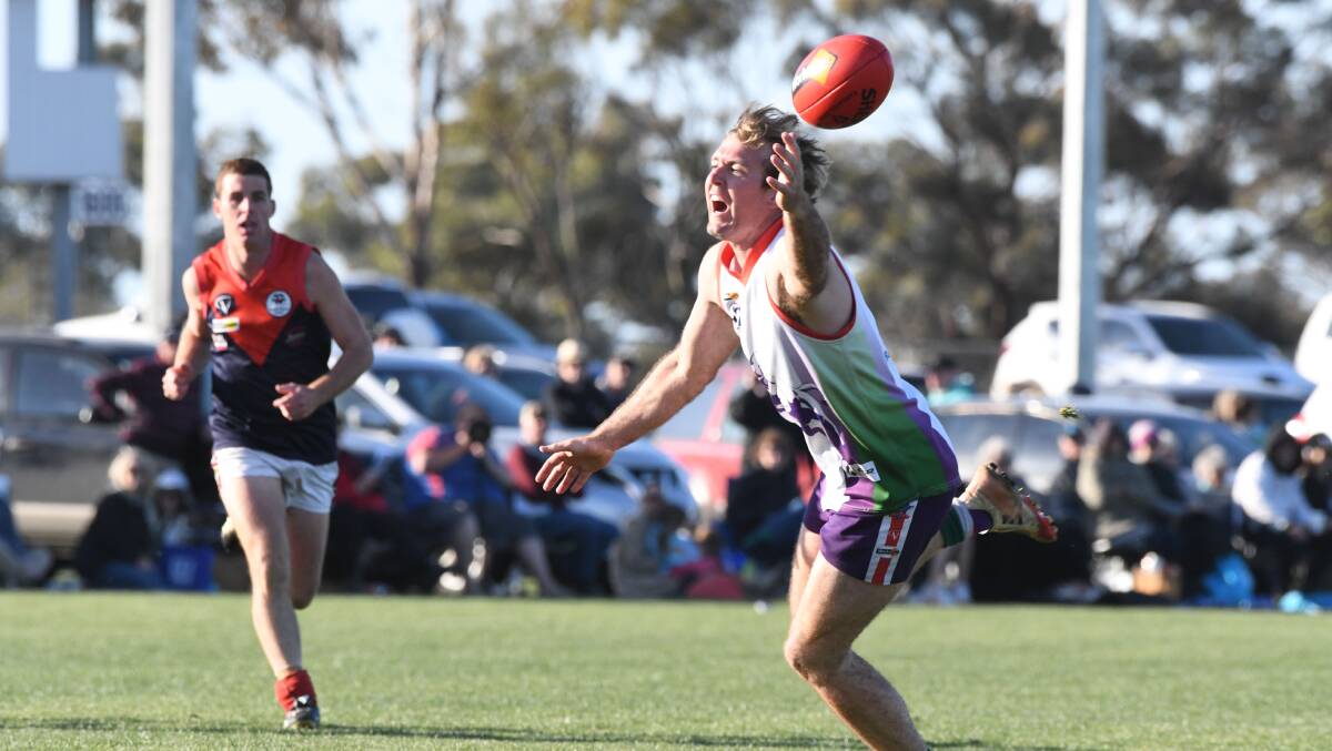 STRETCH: Birchip-Watchem's Lachlan Foott during last Saturday's 12-point grand final loss to Wycheproof-Narraport at Boort. Picture: NONI HYETT