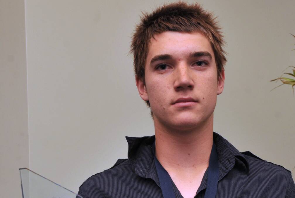 Here's a young Dusty after winning the 2008 BFNL Rising Star Award.