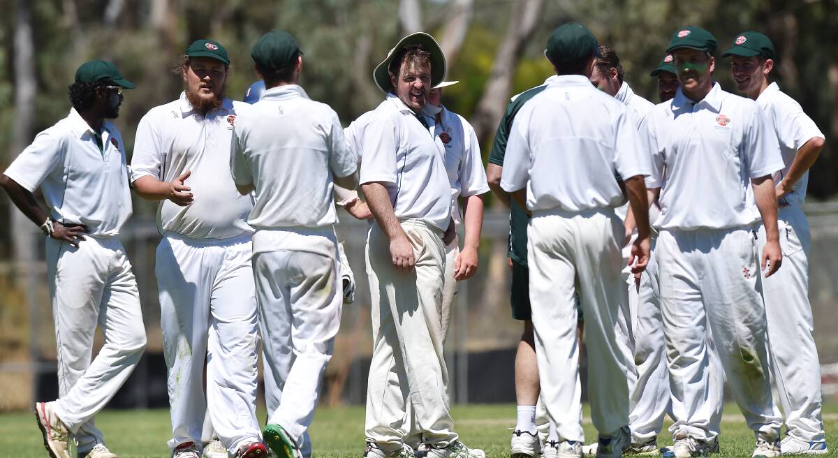 FINISHING ON A HIGH: Gisborne players celebrate a wicket in their victory over Northern Districts at Strathdale on Thursday. Picture: NONI HYETT