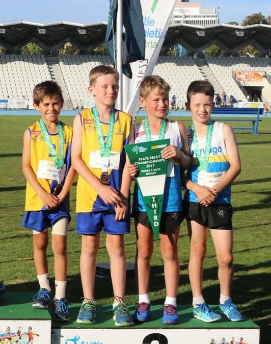 ON THE PODIUM: Bendigo's under-9 boys medley relay team that won a bronze medal last Saturday. Picture: CONTRIBUTED