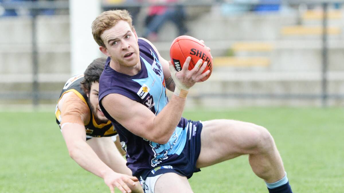 Ben McPhee was best for Eaglehawk when the Tigers came from 26 points down at half-time to beat Kyneton by 26 in round one, 2014. The match was Kyneton's return to senior competition after sitting out 2013.