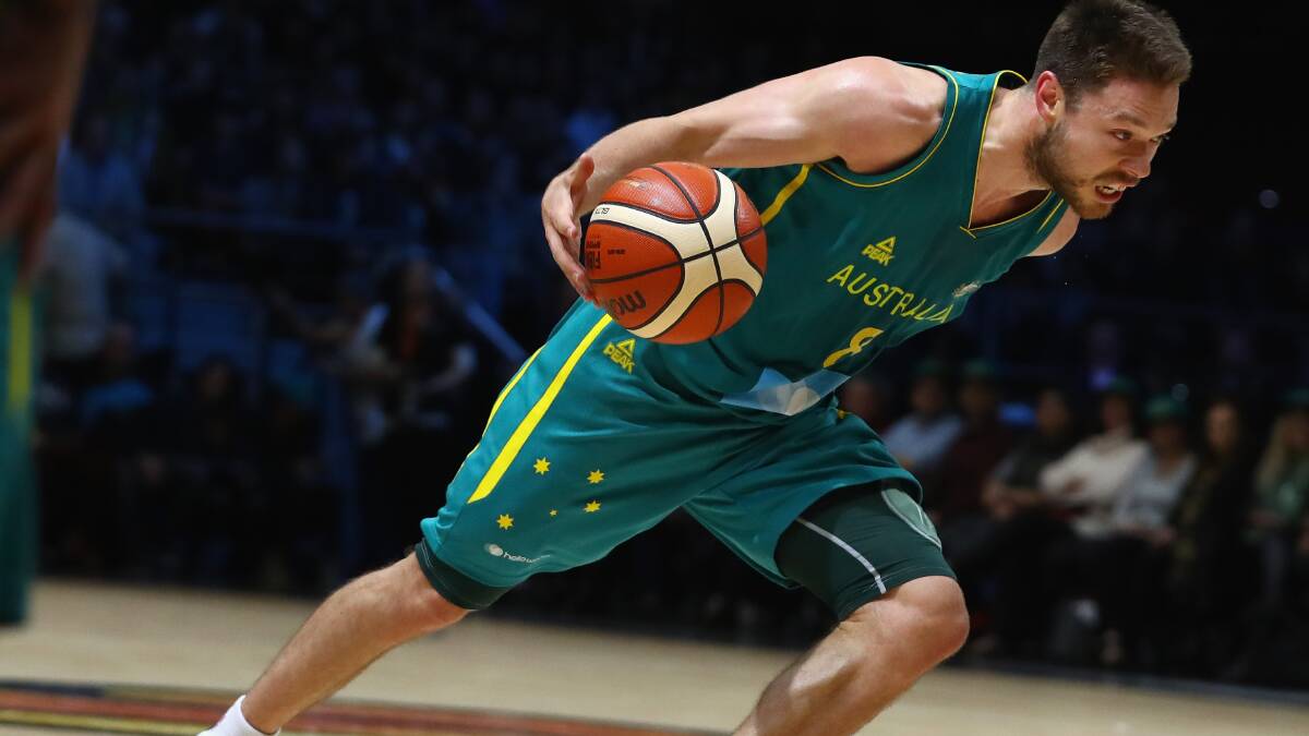 Matthew Dellavedova scored four points and had 10 assists in Australia's win over France. Picture: GETTY IMAGES