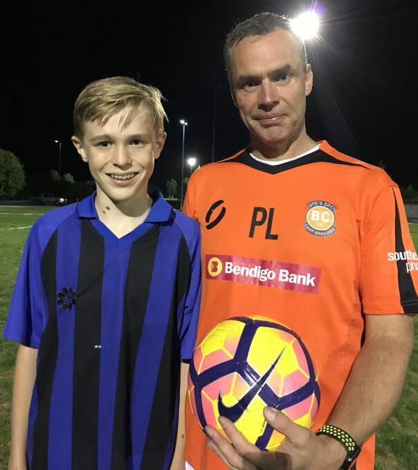 Joshua Beekes with Bendigo City FC's Peter Lodwijks.