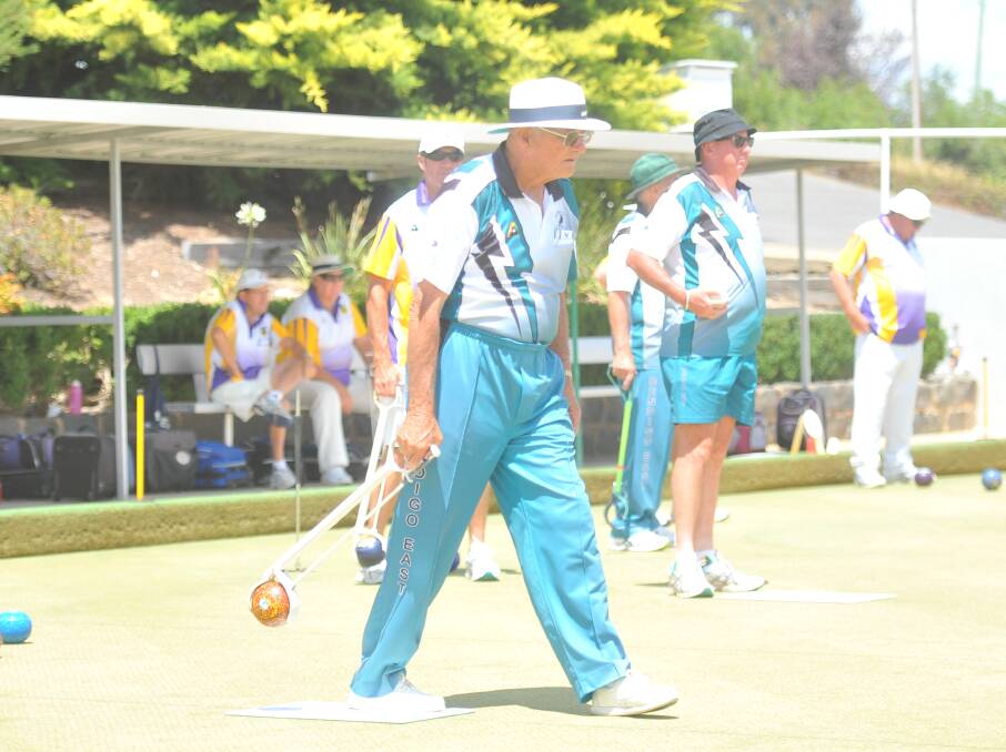 Bendigo East's Ken Gloster bowls in his 700th pennant game on Saturday. Picture: LUKE WEST