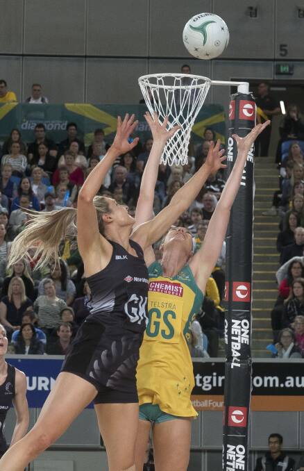 Australia and New Zealand playing a netball international in Melbourne last year. Picture: AAP IMAGE