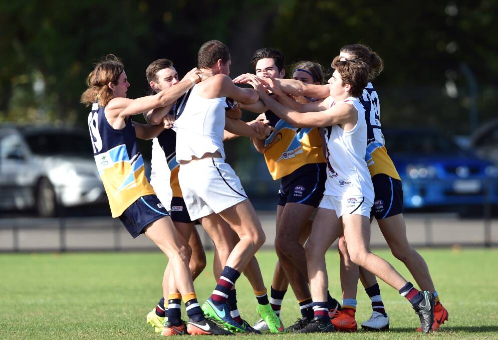 NO BACKWARDS STEP: Tempers fray during the Bendigo Pioneers' 21-point win over Sandringham at the QEO on Sunday. Picture: GLENN DANIELS