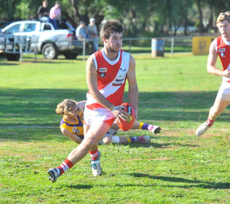 TWO ON THE TROT: Bridgewater's Kyle Chant kicks against Bears Lagoon-Serpentine on Saturday. The Mean Machine have won their past two games and are back in the Loddon Valley top three. Picture: ADAM BOURKE
