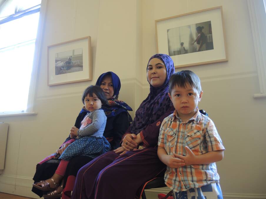 SANCTUARY FOUND: Alizada M Juma (3) Tahira Zahir, Elihe Azimi (2) and Hussnia Hussian Ali – Tahira is from Pakistan and Hussnia from Afghanistan but both are Hazaras, an ethnic minority persecuted by the Taliban. Picture: JOSEPH HINCHLIFFE