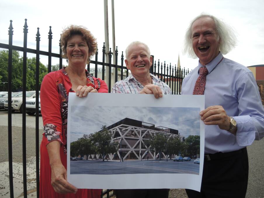 HIGH RISE: City of Greater Bendigo planning and development director Prue Mansfield, developer Ron Poyser and mayor Rod Fyffe with development plans at the site of the proposed four storey-building on High Street. 
