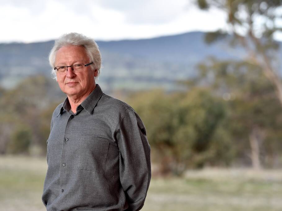 PUT IN PLACE: Raimond Gaita on the balcony of his Baringhup home, overlooking the landscape celebrated in his award-winning book 'Romulus my Father'. Picture: JODIE WIEGARD 