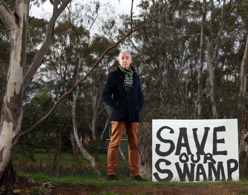 OCCUPY: Kangaroo Flat resident Greig Pairman promised residents would 'occupy' a 2.7 hectare wetland off High Street if a proposed development went ahead last night.

