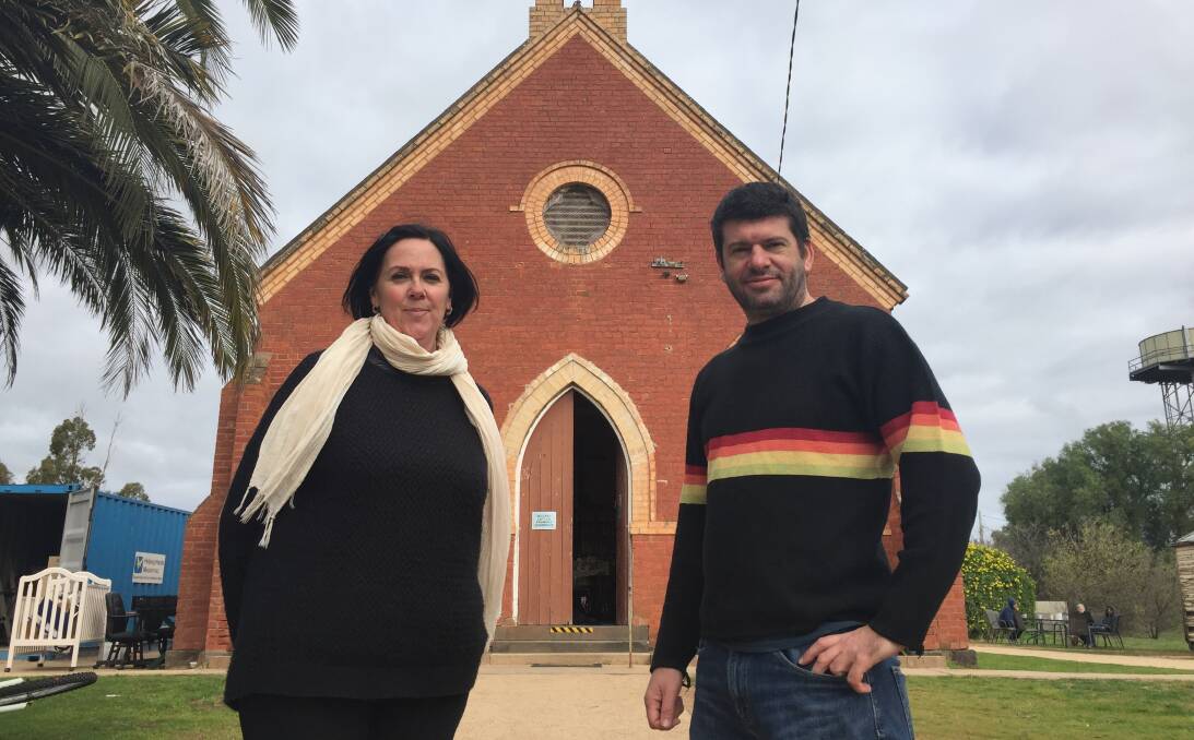 DON'T JUDGE A BOOK BY ITS COVER: Marnie Jones was unemployed and now runs a community op shop in Bridgewater, while Paul Whitfield is on work for the dole and is working on his third novel. Picture: JOSEPH HINCHLIFFE