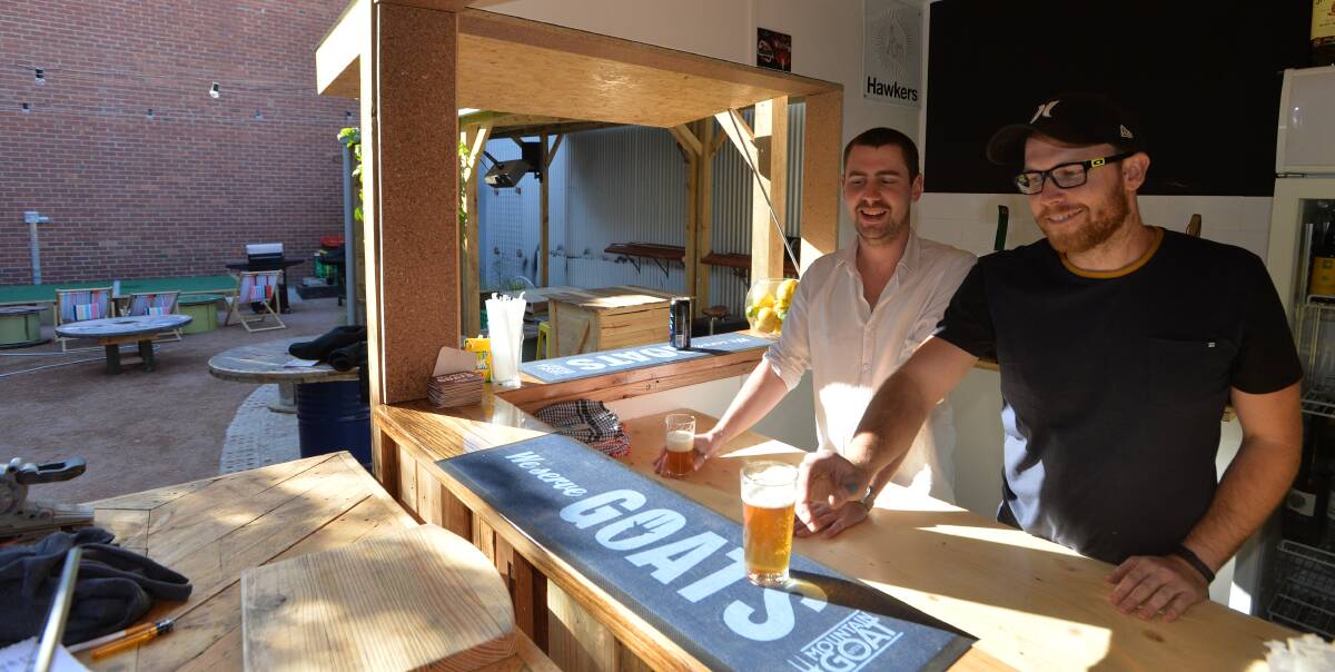 FRESH SPACE: Co-director Jesse Gollan and manager James Baehnisch at the soon-to-be-opened Handle Bar, which will convert an unused space into a venue for events, performances... and craft beer. Picture: JOSEPH HINCHLIFFE