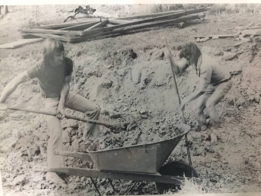 HAND MADE: A young Robert Marshall makes mud-bricks on the Strathdale property to build Nanga Gnulle in 1972. 