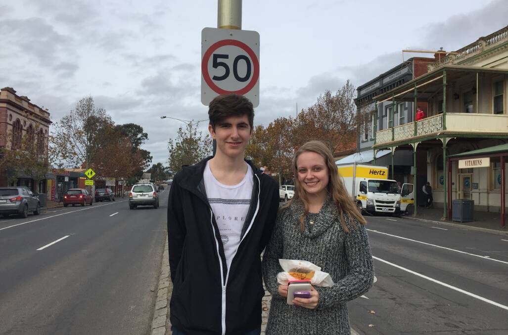 NOT SO FAST: Sam Barber and Hayley Burton at Napier St and High St intersection – Sam says morning traffic is already too slow. Picture: JOSEPH HINCHLIFFE