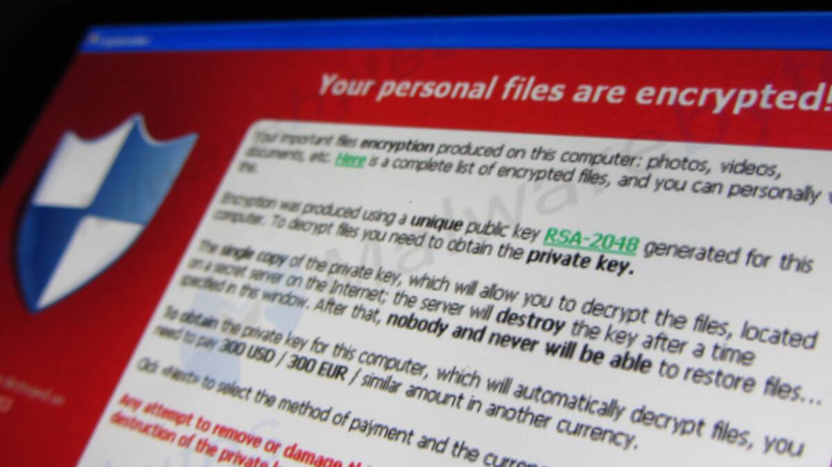 HACKED: Variations of this message appear on computers infected with cryptolocker ransomware – giving users an ultimatum to pay or lose their documents forever. Picture: CHRISTIAAN COLEN