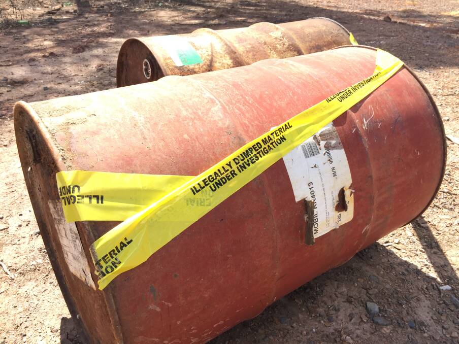 INVESTIGATION: Several fuel drums at the site are also being investigated: Picture: JOSEPH HINCHLIFFE
