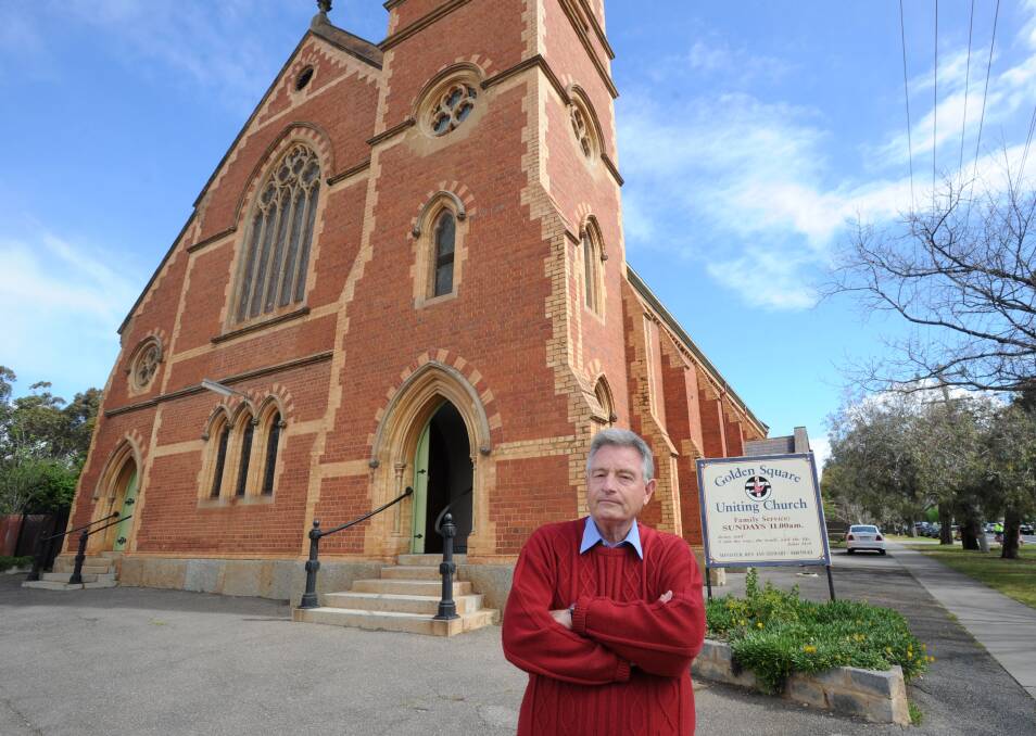 Former parishioner David Wright in front of the Gothic style, slate roof church in Golden Square in 2013. Picture: JODIE WIEGARD