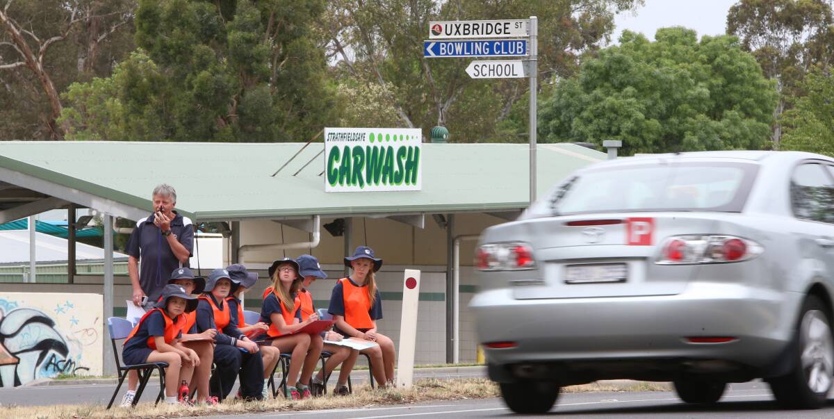 NOT SAFE: Students at Strathfieldsaye Primary School survey potentially unsafe intersections surrounding their schools – 'there have been so many near misses,' Cr Leach said.