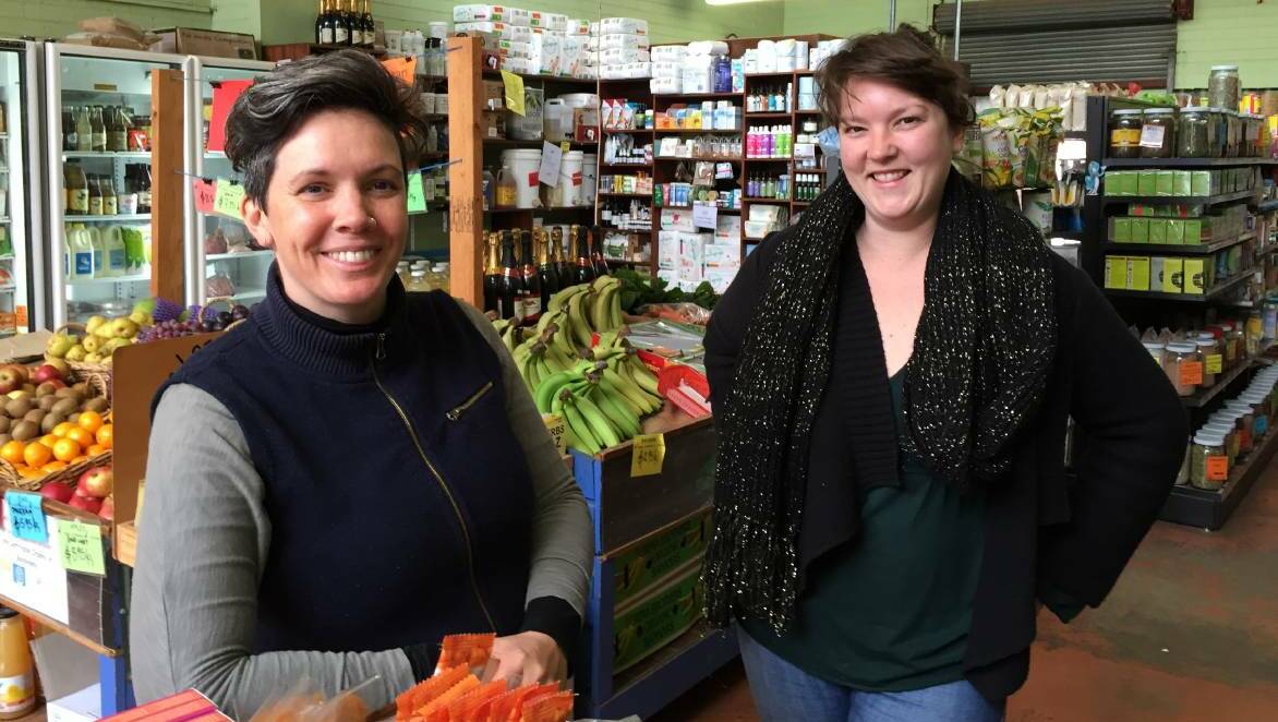 EQUAL RIGHTS AND MENTAL HEALTH: Grocer Bronwyn Peterson and her same-sex partner have a child, her top election issue is same-sex marriage, colleague Theresa Bodno is most concerned about mental health service cuts. Picture: JOSEPH HINCHLIFFE