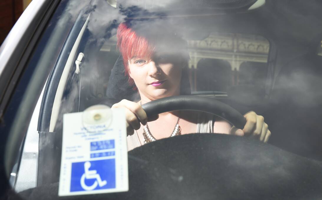 SHOCKED: Dakota Richards, who has cerebral palsy, says she was discriminated against when she parked in a disabled park in Lydiard Street. Picture: Luka Kauzlaric 