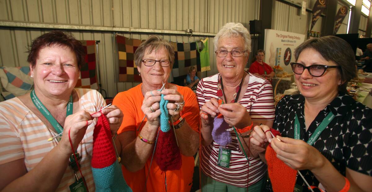 COMMUNITY SPIRIT: Country Women's Association Echuca branch members Delia Currie, Val Jeffreys, Betty Mustey and Johanna Amy knit up a storm. 
