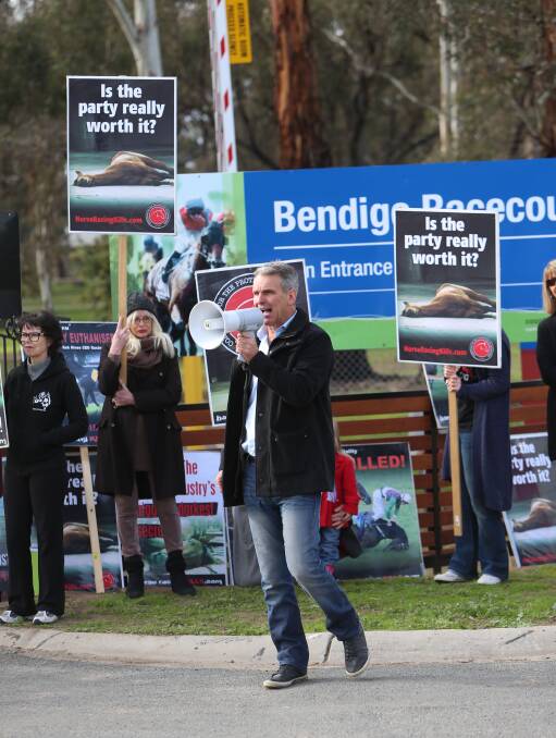 DEMONSTRATION: Elio Celotto leads a protest outside the Bendigo Jockey Club. Picture: PETER WEAVING