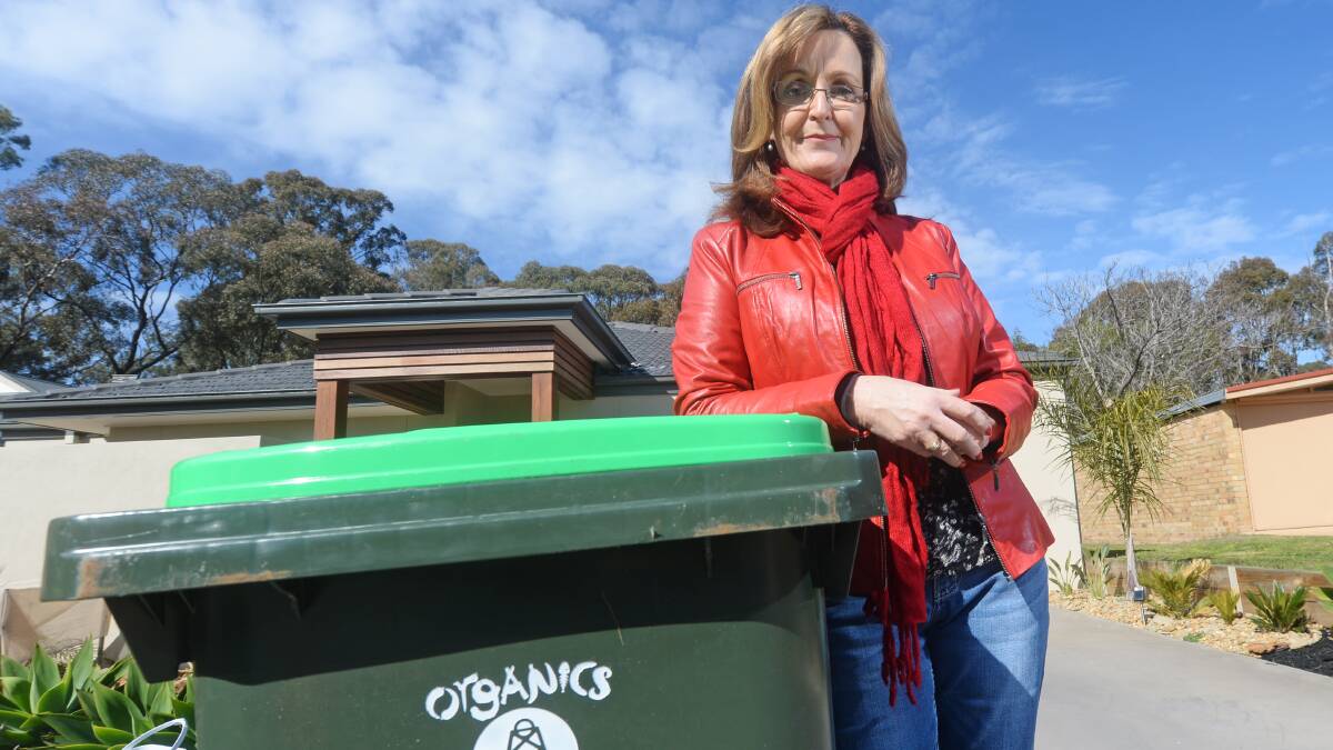 REUSE: Helen Steele, Kennington, has received her new bins. Picture: DARREN HOWE