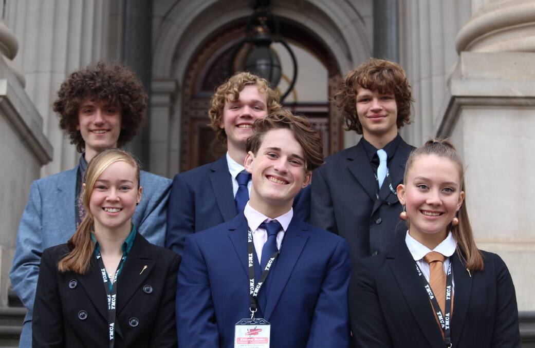 LEADERS: Castlemaine Secondary College students (back) Dante Michielin, Des Cook, Murray Hammersley, (front) Ella Hayes, Nicholas Barker and Sidney Showell on the steps of Parliament House in Spring Street. Picture: SEAN WALES