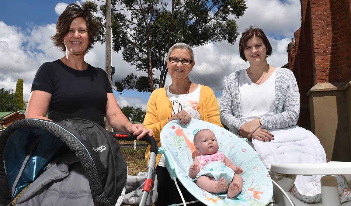 HERE TO HELP: Glenda Serpell, Jan Claridge and Jane Diss want to assist parents struggling to afford all the necessary baby equipment. Picture: NONI HYETT