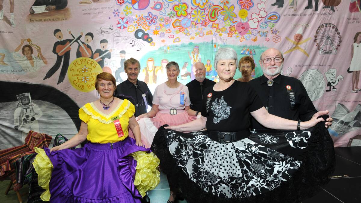 LINING UP: Entrants Doona Young, Tim Cartwell, Rhonda Smith, Barry Wegmann, Annette Instone, Shirlee Bates and Tony Instone prepare for the national square dancing convention in Bendigo. Pictures: NONI HYETT