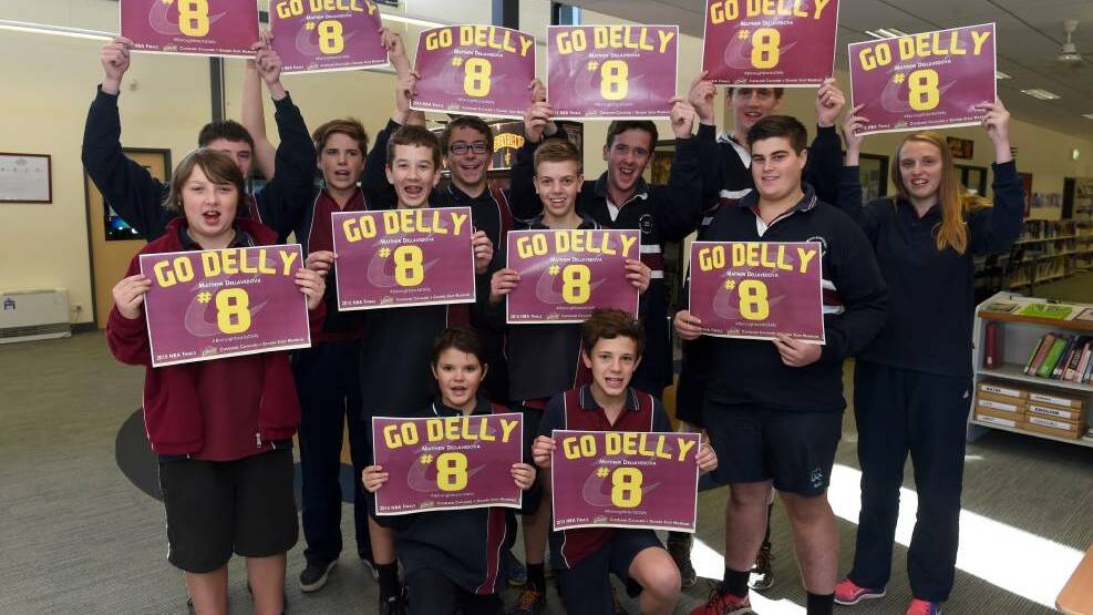 Maryborough Education Centre students hold up posters supporting Matthew Dellavedova last year. Picture: JODIE WIEGARD