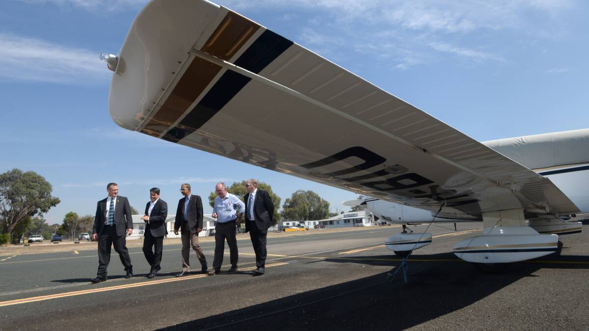 PLANS: Councillors and council officials at Bendigo Airport in 2014. Stage two of the redevelopment will soon begin. Picture: JIM ALDERSEY