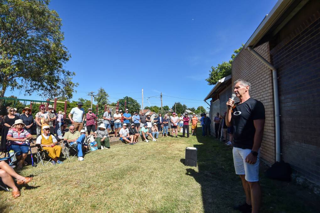 A speaker at a rally calls for the Bendigo East pool to stay open in winter. Picture by Darren Howe.