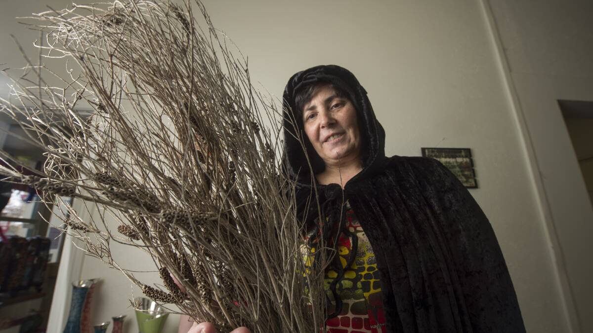 SWEEPING OUT BAD ENERGY: Johanna Hobson with shows off the bristly end of her new broom, which she made during witch classes a few weeks ago. Picture: DARREN HOWE