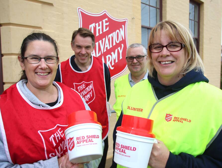 The Salvos will be knocking on doors in just under four weeks. Kelly Walker, Andrew Walker, Chris Marsh and Melissa Marsh for a busy weekend. Picture: GLENN DANIELS