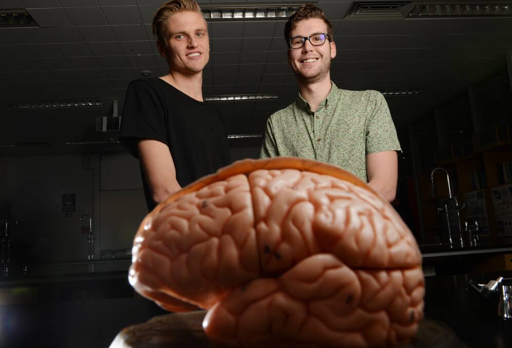 RESEARCH: Lachlan Van Shiek and Will Sievers are searching for ways to trigger the brain into activating people's metabolisms. Picture: DARREN HOWE