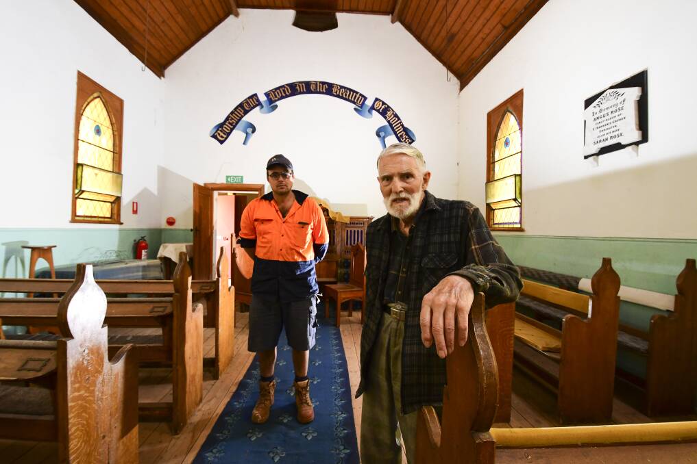 SACRED SPACE: Simon Morrison and Clifford Kirby admire the beautiful interior of the Eddington Uniting Church. Church authorities are considering selling it. NONI HYETT