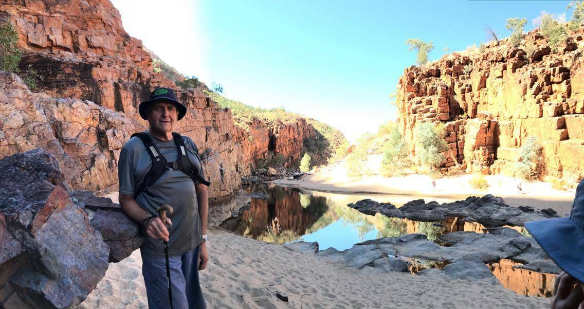 Jeff Barber takes a break during a hike along the Larapinta Trail.