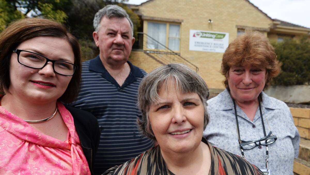 Family budgets stretched: Lisa Chesters has joined volunteers from Uniting Care Bendigo's emergency relief service to call for donations ahead of the back-to-school rush. Picture: Darren Howe.