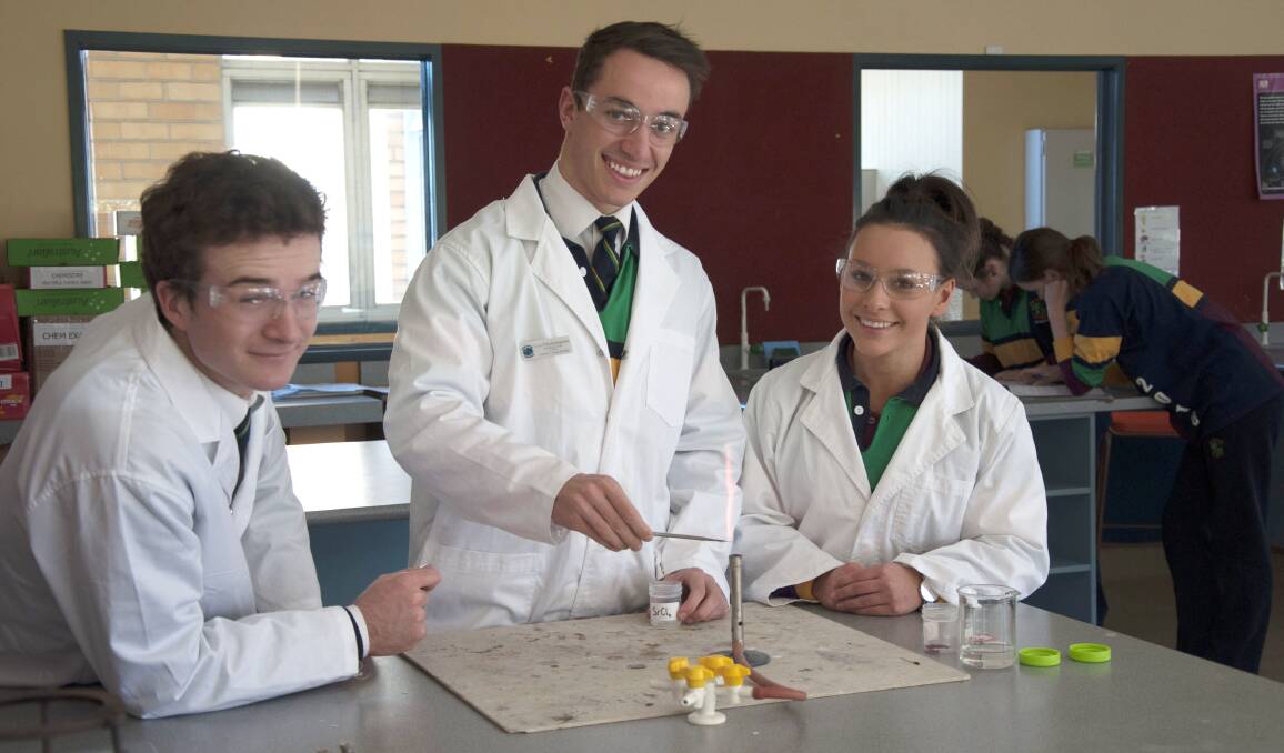 IN THE LAB: Year 12 science students Thomas Houlden, Leon Polychronopoulos and Eliza Sabaliauskas. Picture: CONTRIBUTED