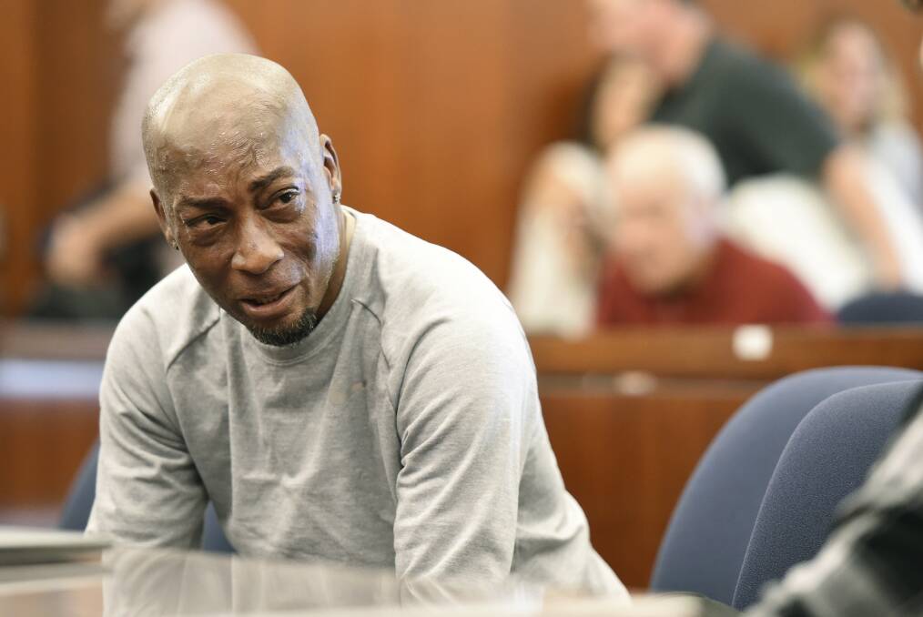 Plaintiff Dewayne Johnson reacts after hearing the verdict in his case against Monsanto at the Superior Court of California in San Francisco on Friday. Picture: Josh Edelson/Pool Photo via AP