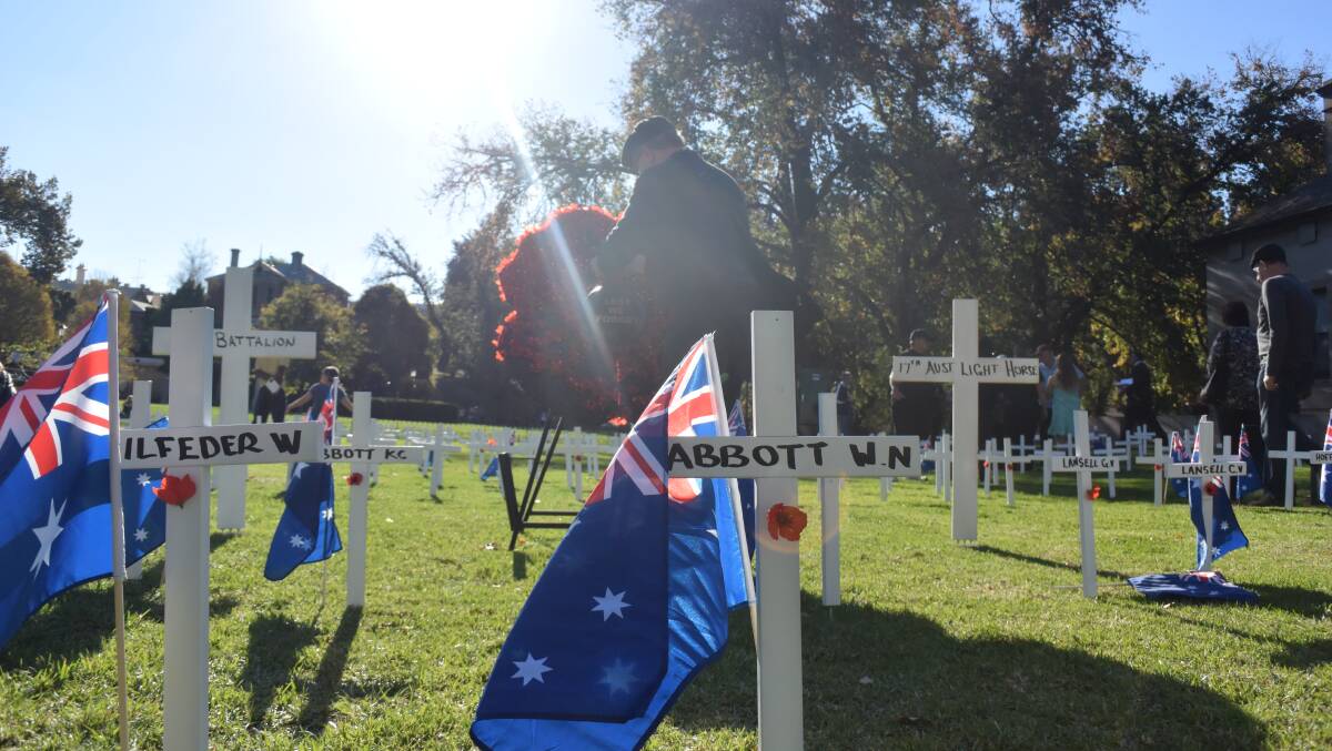 PAYING RESPECTS: The Field of Remembrance on the eve of Anzac Day 2016. More of those who fought in World War One will be remembered with crosses at an upcoming service in Bendigo.