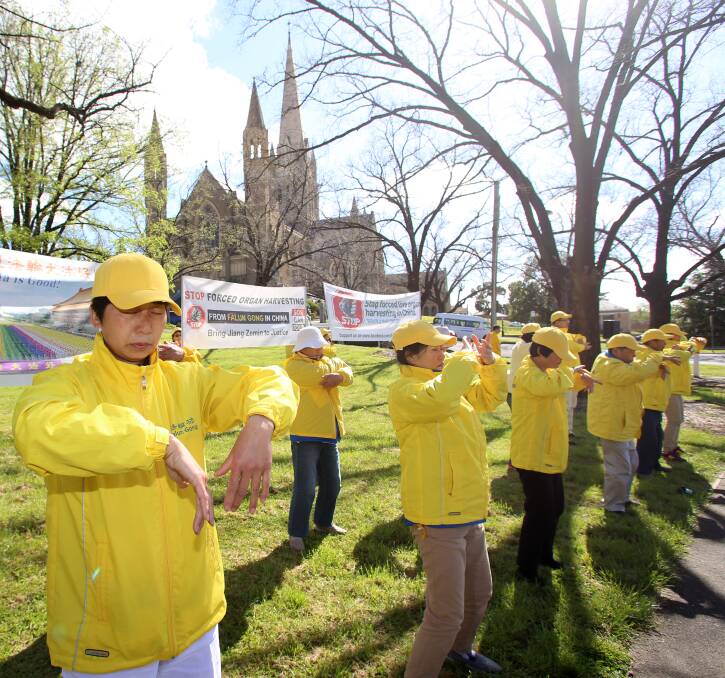 QUITE MOMENT: Campaigners perform Falun Gong exercises in Bendigo, amid calls for China to stop alleged organ harvesting. Picture: GLENN DANIELS