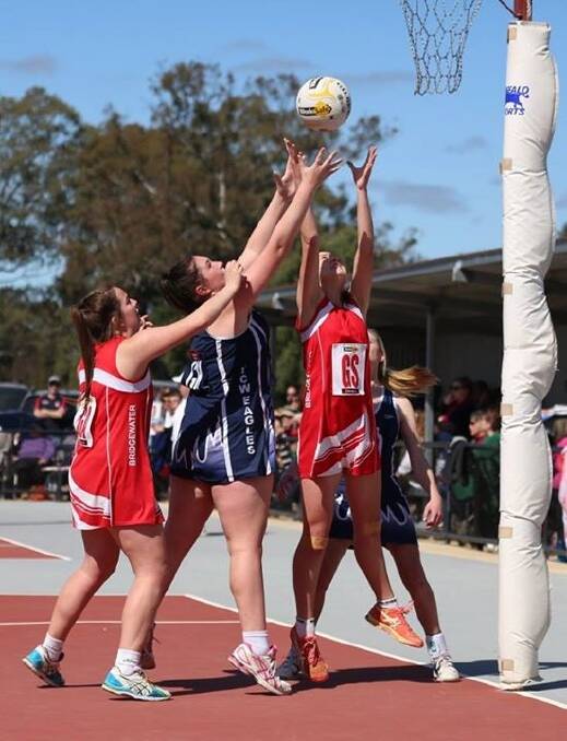 Best action shot: Sent in by Joan Merrin/Photo by Tracey Webb: Breana Merrin (GS) going for the rebound.
