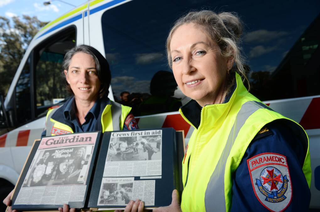 Bendigo MICA paramedics Sue Walsh and Julie Scollary both began their careers with Ambulance Victoria in 1996. Pictures: DARREN HOWE