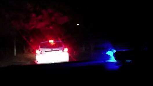 This white hatchback was pulled over by a driver impersonating police. Picture: SUPPLIED