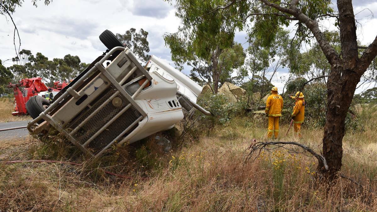 The Axedale-Kimbolton Road is no stranger to rollovers, with this hay truck crashing in December last year. Click or touch the photo to read more.